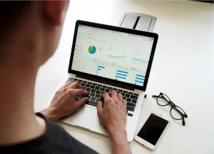 A Man Working On His Computer Local SEO