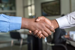 Shaking Hands on a deal with your ideal customer